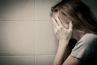 Distressed woman - Nebraska domestic violence laws